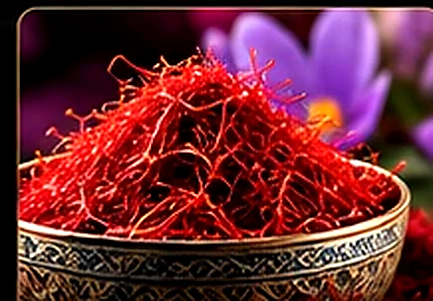 Red saffron threads in an ornate bowl